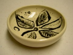 Learn more about using pottery glazes. clay pot pattern bowl with leaf design