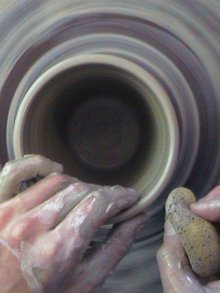making clay pottery images compressing the rim