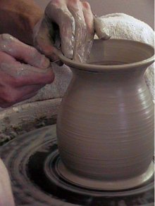 making clay pottery images trimming the rim